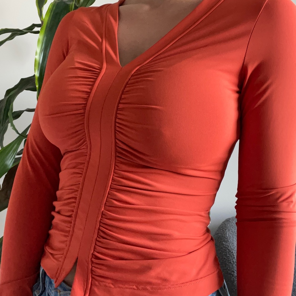 Orange fitted rouged top